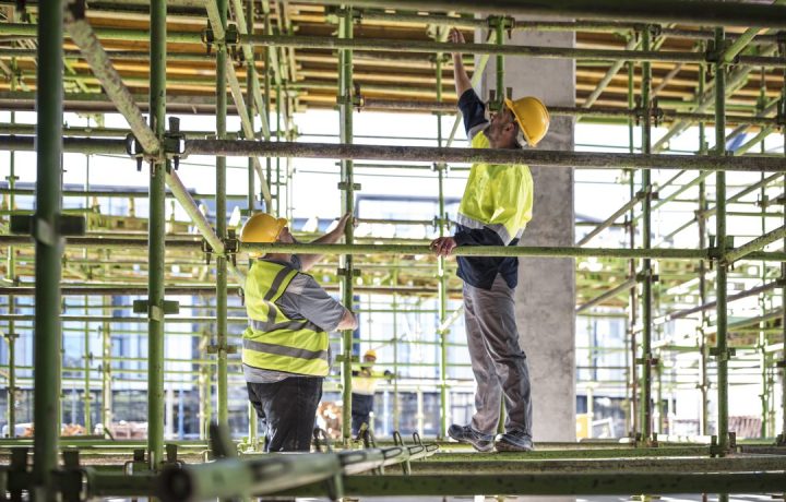 construction-workers-on-scaffolding-2023-11-27-05-00-07-utc